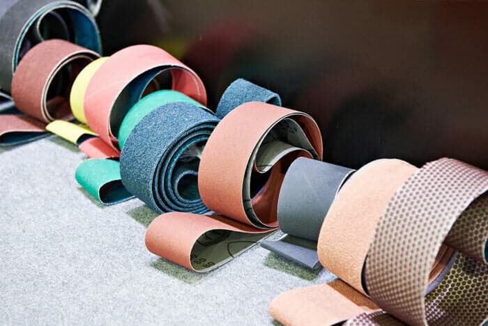 rolls of sandpaper in various colors