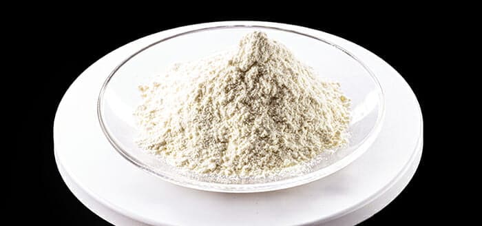 Pile of trisodium chloride phosphate on white background